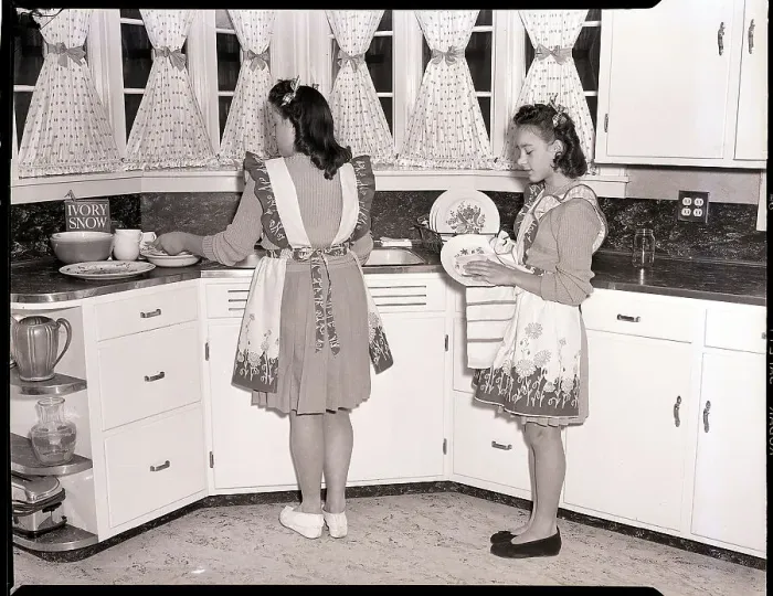 Framed Print : Two Young Women Washing Dishes Framed Print : Two Young Women Washing Dishes
