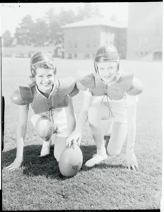 Framed Print : Younger Lucille Ball and Friend Kneeling With Football Framed Print : Younger Lucille Ball and Friend Kneeling With Football