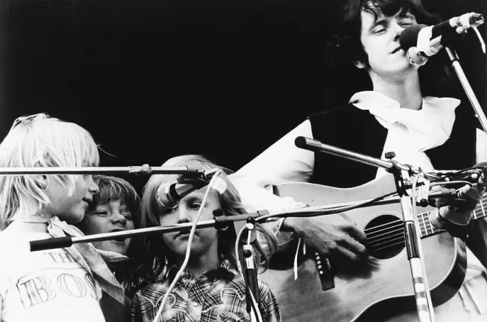 Framed Print : Youngsters Singing With Singer Donovan Framed Print : Youngsters Singing With Singer Donovan