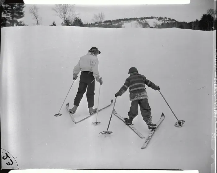 Framed Print : Youngsters Walking up Slope on Their Skis Framed Print : Youngsters Walking up Slope on Their Skis