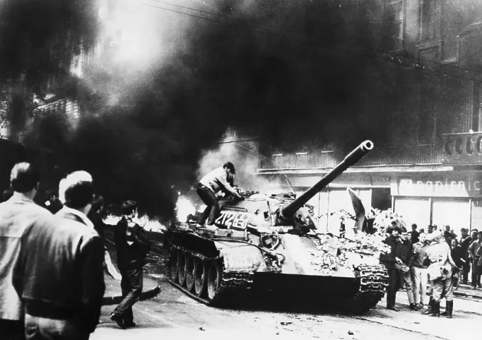 Framed Print : Youth Climbs on Tank as Smoke Fills Air Framed Print : Youth Climbs on Tank as Smoke Fills Air