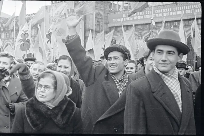 Framed Print : Youth Waving from Crowd Framed Print : Youth Waving from Crowd