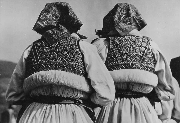 Yugoslavs. circa 1939: Two Yugoslav women wearing national costume