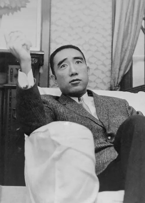 Framed Print : Yukio Mishimi Sitting on Couch Framed Print : Yukio Mishimi Sitting on Couch