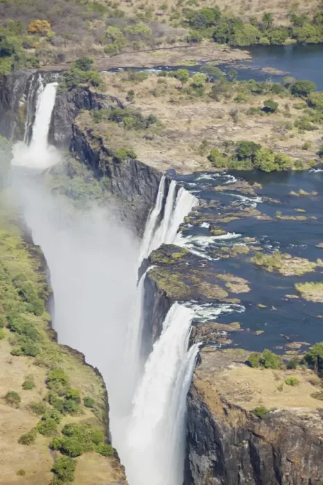 Framed Print : Zambezi River flowing over Victoria Falls, aerial view