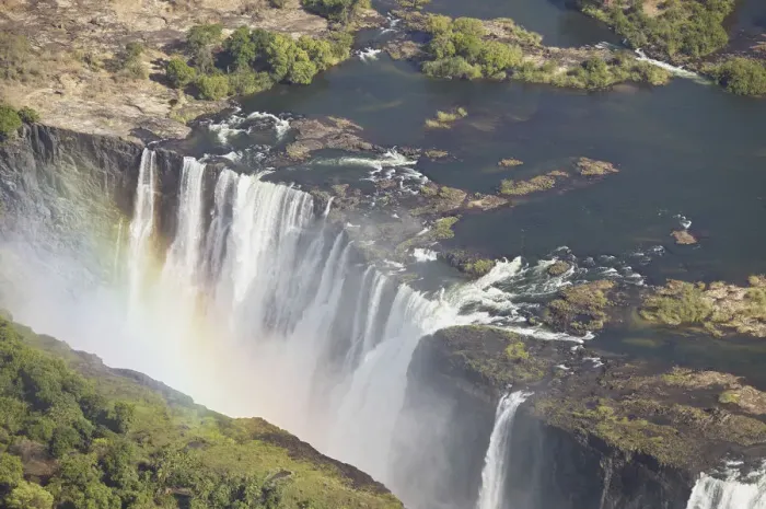 Framed Print : Zambezi River flowing over Victoria Falls, aerial view
