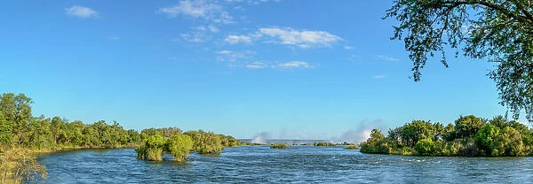 Zambezi River view with the spray from Victoria Falls in the distance. Livingstone. Zambia