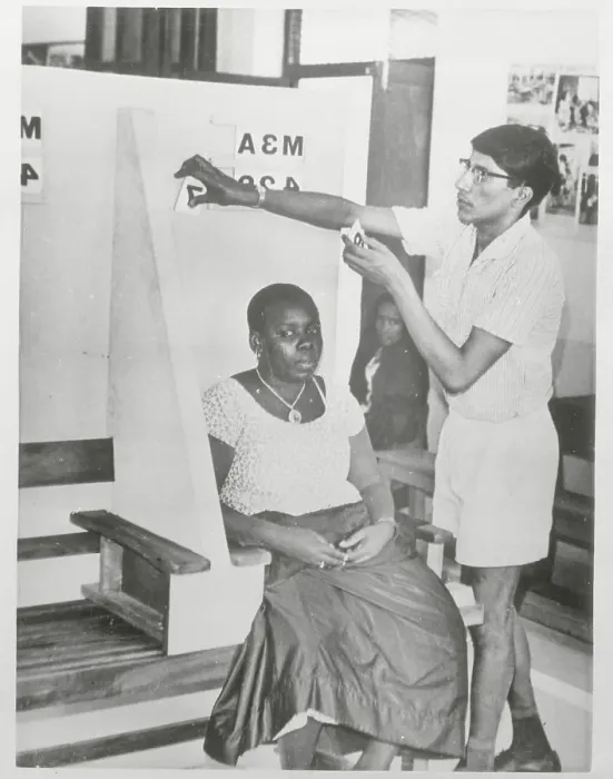 Framed Print : Zanzibar Citizen Being Photographed for Voting Registration Framed Print : Zanzibar Citizen Being Photographed for Voting Registration