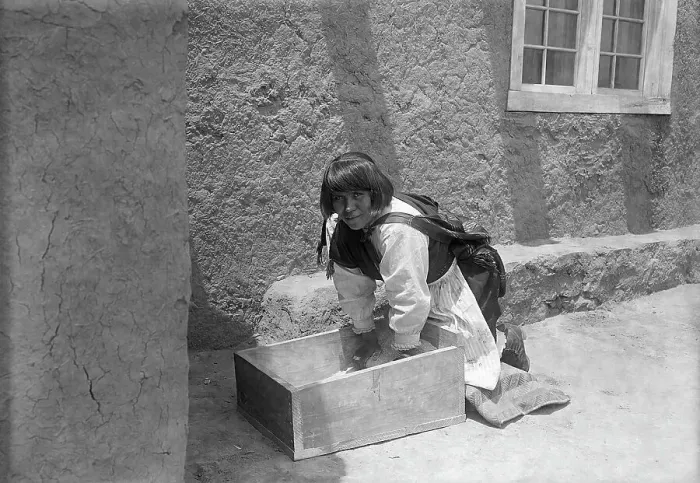 Framed Print : Zuni Woman Grinding Corn