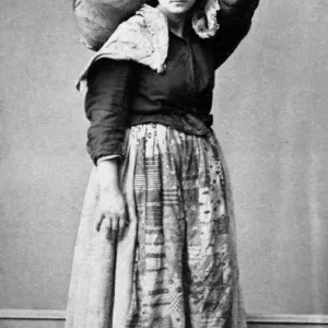 Vintage Black and White Print of a Young Woman Carrying a Basket Vintage Black and White Print of a Young Woman Carrying a Basket