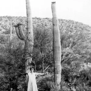 Vintage Black and White Print of a Child Standing by a Cactus Vintage Black and White Print of a Child Standing by a Cactus