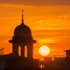Abstract background of Silhouette Mosque with sunset in the evening in yangon, myanmar
