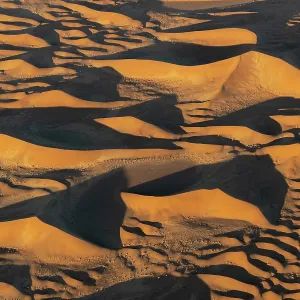 Aerial photograph taken at dawn from a helicopter, Namib Desert, Sossusvlei, Namibia Aerial photograph taken at dawn from a helicopter, Namib Desert, Sossusvlei, Namibia