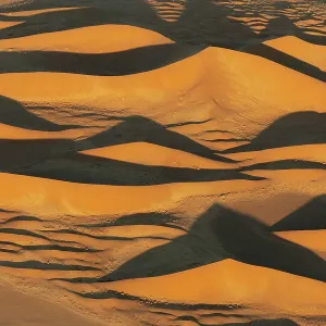 Aerial photograph taken at dawn from a helicopter, Namib Desert, Sossusvlei, Namibia Aerial photograph taken at dawn from a helicopter, Namib Desert, Sossusvlei, Namibia