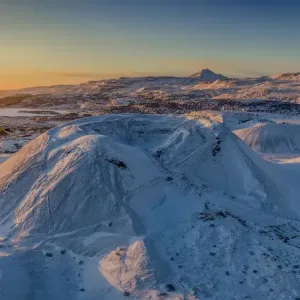 Aerial of snow covered mountains and lava Aerial of snow covered mountains and lava
