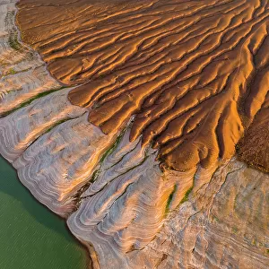 Aerial view of the dry reservoir in mountains