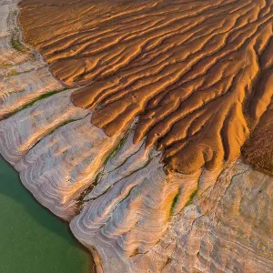 Aerial view of the dry reservoir in mountains Aerial view of the dry reservoir in mountains