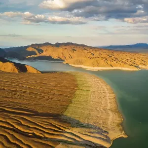 Aerial view of the dry reservoir in mountains Aerial view of the dry reservoir in mountains