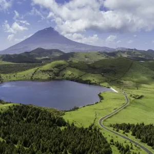 Aerial view of Lagoa do Caiado in the central highlands of Pico Island with Pico Mountain Aerial view of Lagoa do Caiado in the central highlands of Pico Island with Pico Mountain