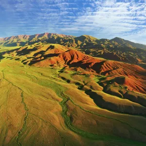 Aerial view of mountain landscape in Kyrgyzstan at sunset