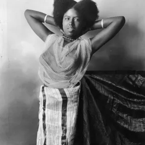 Afro Woman Print circa 1930: A Moroccan woman with a parted afro hairstyle Afro Woman Print circa 1930: A Moroccan woman with a parted afro hairstyle
