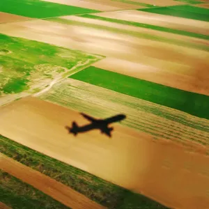 Airplane Shadow Print on Farm Fields in Austria Airplane Shadow Print on Farm Fields in Austria