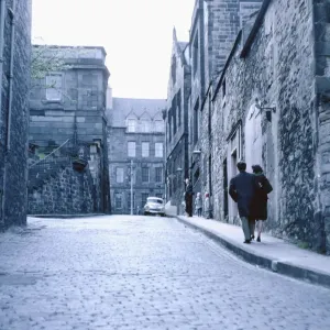 alley, architecture, back view, bleak, brick, buildings, chilly, city, cobbled, cobblestones