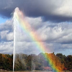 Alster Fountain, water fountain creating a rainbow on the Inner Alster Lake in the center of Hamburg, Germany, Europe