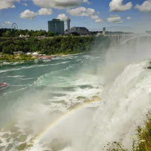 The American Falls with the Rainbow bridge, Niagara Falls, US The American Falls with the Rainbow bridge, Niagara Falls, US