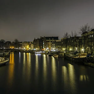 An Amsterdam Canal At Night