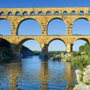 antiquity, attraction, blue sky, bridge, cloudless, column, cropped, french, gardon