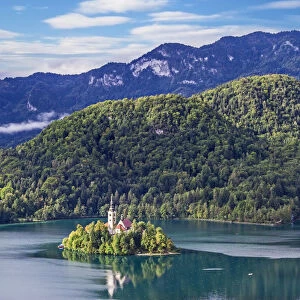 Assumption of Mary Church on an island at Lake Bled, and Julian Alps in background, Gorenjska, Balkan Peninsula, Carniola, Slovenia
