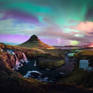 Aurora borealis dancing above the signature mountain snaefellnes kirkjufell in winter