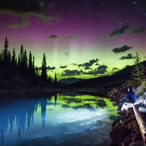 The aurora borealis above the turquoise waters of Moraine Lake, Banff National Park, Alberta, Canada The aurora borealis above the turquoise waters of Moraine Lake, Banff National Park, Alberta, Canada