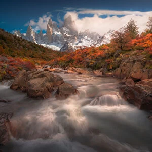 Autumn view of cascade in Patagonia with Mount Fitzroy background