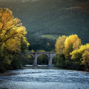 Autumn view along the Orb river located in the Languedoc region of southern France Autumn view along the Orb river located in the Languedoc region of southern France