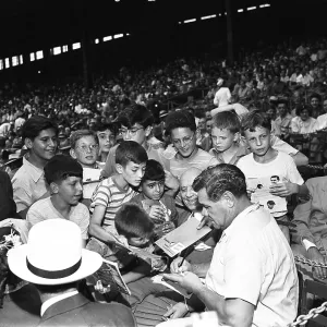 Babe Ruth Signs Autographs