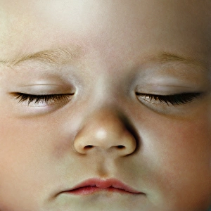 Baby boy (3-6 months), eyes closed, close-up