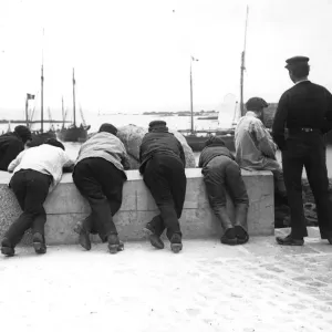 Barfleur Bums Print circa 1900: Eight men standing at the French coast Barfleur Bums Print circa 1900: Eight men standing at the French coast