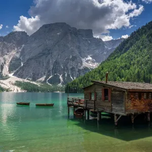 Beautiful landscape of Braies Lake (Lago di Braies) with wooden bridge