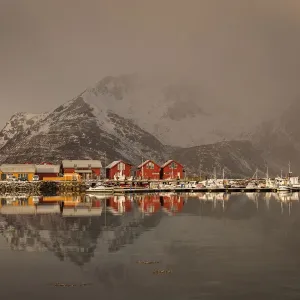 Beautiful landscape with clouds, fog, water, reflectaion in background at Lofoten Island, Norway Beautiful landscape with clouds, fog, water, reflectaion in background at Lofoten Island, Norway
