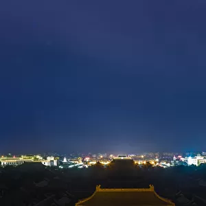 Beijing night with the Forbidden City in the cente