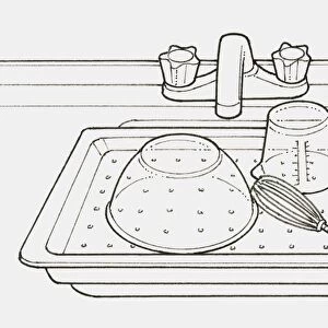 Black and white illustration of a tray with holes in it, placed over sink and used as a drainer