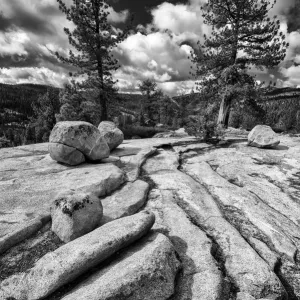 Black and white image of granite outcropping with boulders, Yosemite National Park, California, USA