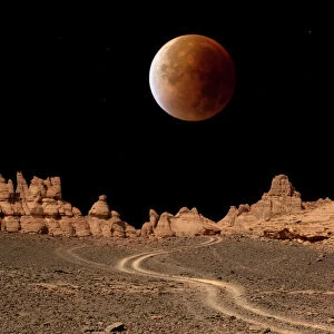 Blood moon over Libyan desert