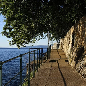 The boardwalk trail along the rocky coast, Lovran, Istria, Croatia