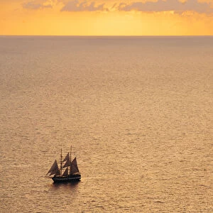 Boat sailing in the sea during sunset