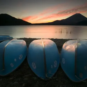 Boats on shore of Lake Motosu with Mount Fuji in background, Fuji-Hakone-Izu National Park, Honshu, Japan Boats on shore of Lake Motosu with Mount Fuji in background, Fuji-Hakone-Izu National Park, Honshu, Japan