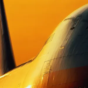 Boeing 747 passenger aircraft at sunset, close-up Boeing 747 passenger aircraft at sunset, close-up