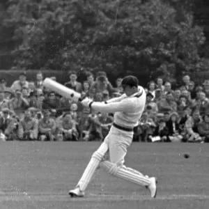A Bowler Bats